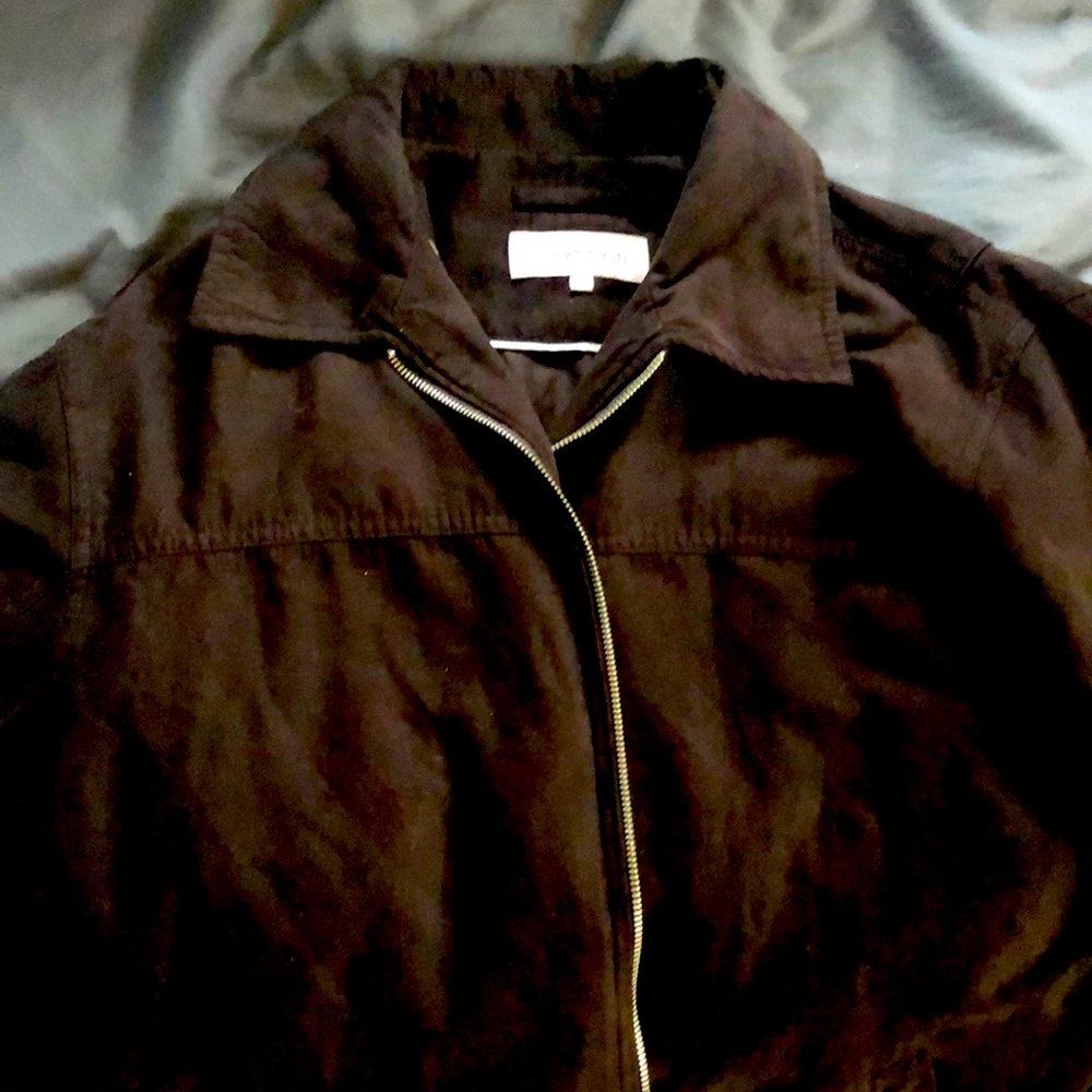 Has been worn now washed. No tears or rips. No stains.